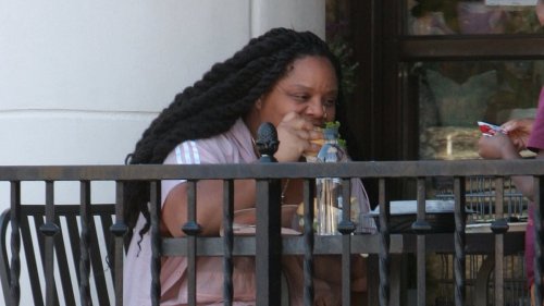 BLM co-founder Patrisse Cullors is seen scarfing down lunch as she goes grocery shopping with son at...