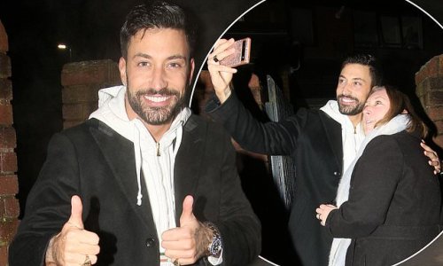 Strictly Come Dancing star Giovanni Pernice beams as he greets a group of waiting female fans after his new show Made In Italy