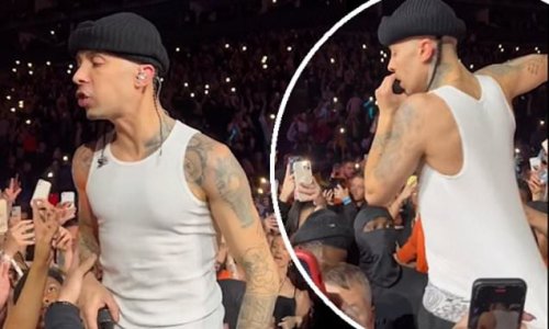 Unhappy Dappy! Furious N-Dubz star puts a fan in their place as they GRAB his top and pull him over during a gig - as he shares the video online