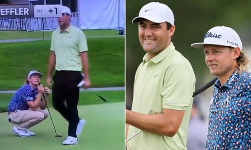 The LIV v PGA Tour battle takes to the course! World No 1 Scottie Scheffler walks directly across rumored Saudi rebel Cameron Smith's line days after the Masters winner scolded defectors