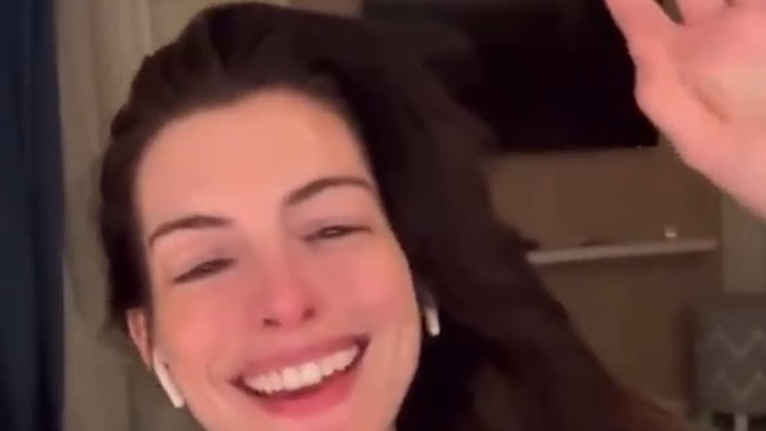 Hollywood star Anne Hathaway mocked for cringeworthy rendition of Arsenal's club anthem - written by son of Loose Women star - after seeing her team beat Real Madrid