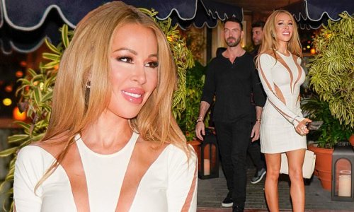 RHOM star Lisa Hochstein stuns in a white cut-out minidress as she enjoys dinner date with rumored new love interest Jody Glidden in Miami