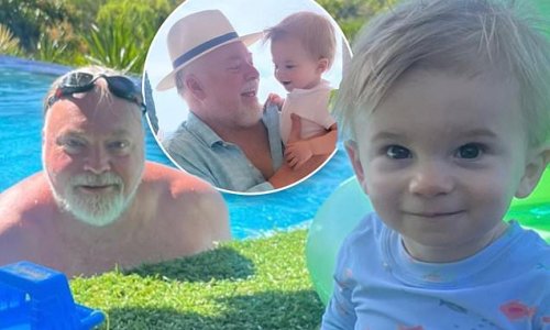 Kyle Sandilands shares adorable poolside moment with son Otto during family getaway at their house in Queensland
