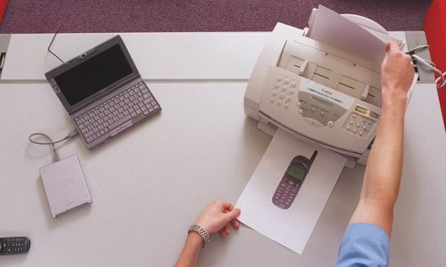 Gen Z officer workers are suffering 'burnout' because they're flummoxed by fax machines and other old tech, study finds