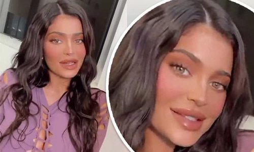 Kylie Jenner dazzles in a lilac cut-out dress that flashes cleavage