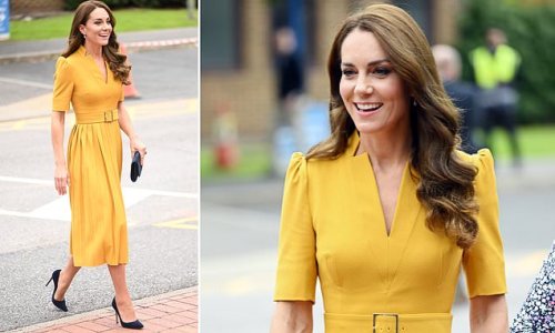 A ray of sunshine! The Princess of Wales is radiant in a £220 pleated yellow Karen Millen midi dress as she visits the maternity unit at the Royal Surrey County Hospital
