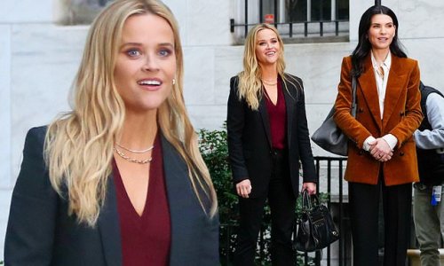 Reese Witherspoon and co-star Julianna Margulies opt for business chic in stylish suits while on set of The Morning Show in NYC