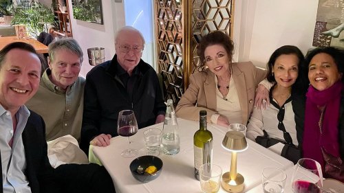 Joan Collins, 90, and husband Percy Gibson, 59, enjoy a boozy triple lunch date with Michael Caine...