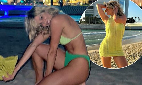 Ashley Roberts flaunts her enviable figure in a tiny yellow and green bikini before slipping into a skimpy crochet dress amid lavish Dubai holiday