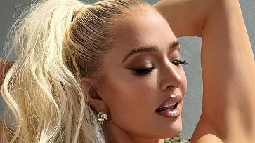 Erika Jayne sizzles in skimpy swimsuit as she reacts to RHOBH co-star's shock divorce filing