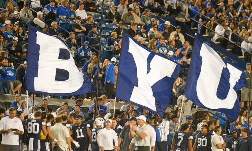 BYU is hit by a fresh allegation of racist abuse after five women's soccer players claim they heard shouts of 'Stand up, N-words' from the crowd as they knelt during the national anthem
