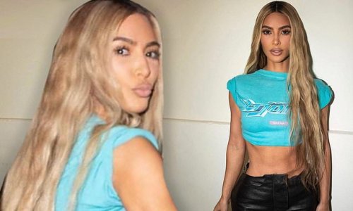 Kim Kardashian Flaunts Her Taut Tummy In A Crop Top And Leather Pants