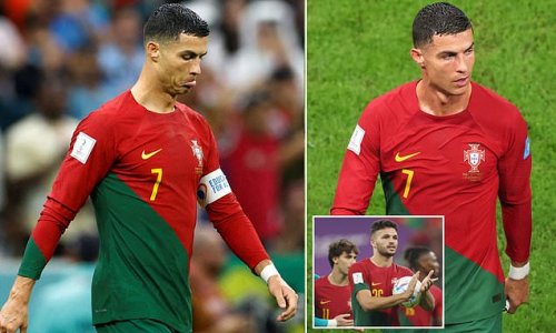 Cristiano Ronaldo walks off on his own as his Portugal team-mates celebrate 6-1 thrashing of Switzerland... after he was DROPPED from the XI and his replacement Goncalo Ramos scored a hat-trick