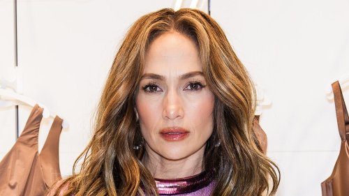 Jennifer Lopez, 54, is radiant as she shows off her incredible figure in a dazzling pink minidress...