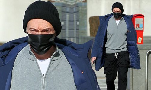 Hugh's that? Broadway star Jackman goes incognito in a beanie, winter coat and face mask before his matinée performance of The Music Man in NYC