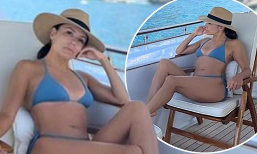 Eva Longoria sends temperatures soaring in a blue bikini as she relaxes aboard a luxury yacht after attending climate change event in Florida