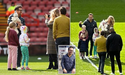 Welcome to Wrexham, kid! Hollywood stars Ryan Reynolds and Blake Lively pose for snaps with newborn baby and their three daughters as they cheer on Welsh football club owned by the actor
