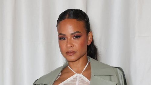 Christina Milian shows off her enviable curves in semi-sheer white dress as she joins an equally...