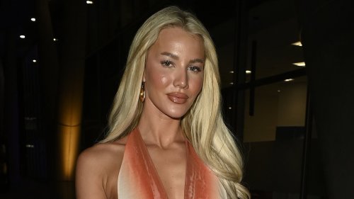 Love Island's Grace Jackson stuns in a plunging multicoloured dress as she joins best pal Harriett Blackmore at fashion launch in Manchester