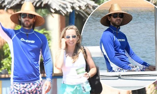 Jared Leto looks relaxed in giant sun hat as he enjoys a holiday with a mystery woman in Sardinia