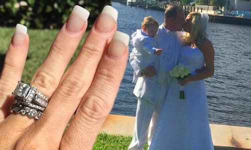 She's out of the picture - literally! Lindsay Lohan's father Michael marries Kate Major in intimate beach ceremony... but 'doesn't invite his famous daughter'