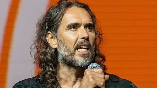 Russell Brand 'is sued for £220,000 for failing to write two self-help books' in deal that was signed before he was accused of sex abuse by four women