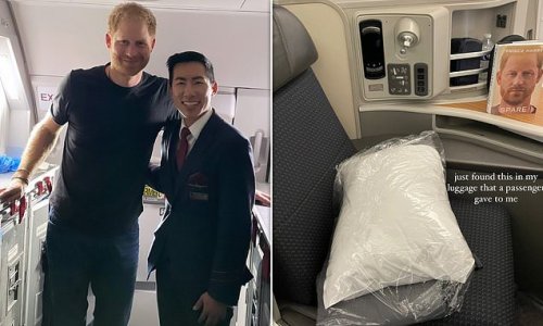 Prince Harry leaves a thank you present for air steward after taking flight - a copy of his tell-all memoir Spare