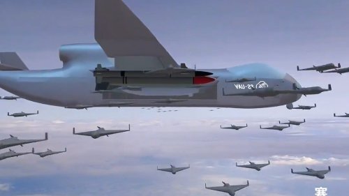 China's drone mothership: Weapons aircraft with 82ft wingspan can fly for 12 hours and 'launch 100 kamikaze UAVs in seconds'