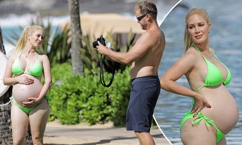 Heidi Montag glows as she shows off her pregnant belly in neon green bikini while husband Spencer Pratt snaps photos during Hawaiian vacation