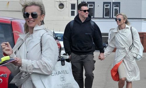 Strictly lovebirds Nadiya Bychkova and Kai Widdrington hold hands as they leave their Blackpool hotel for a stroll during the Professional's Tour