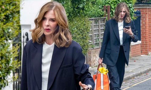 Newly single Trinny Woodall steps out looking glum after ex-partner Charles Saatchi enjoyed a cosy lunch date with model Martha Sitwell at Scott's