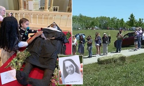 Thousands of Catholics flock to Missouri church to pray over body of 'miracle' nun who was exhumed after four years with NO signs of decay - as they call for her to be made a saint