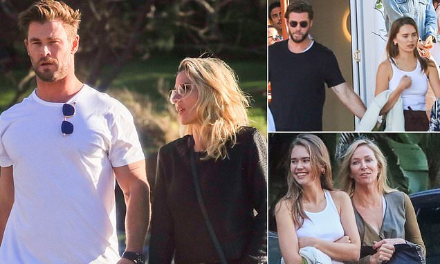 A family affair! Brothers Chris and Liam Hemsworth enjoy a laidback lunch with their partners Elsa Pataky and Gabriella Brooks and parents Craig and Leonie in Byron Bay