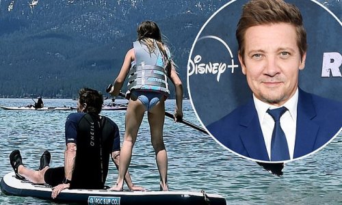 Jeremy Renner enjoys paddle boarding during a trip to Lake Tahoe for Memorial Day weekend...where he suffered snow plow accident six months earlier