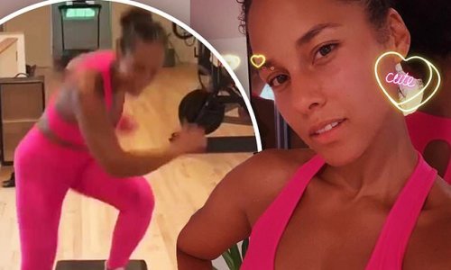 Alicia Keys shows off her toned figure in pink workout gear as she posts a cute selfie to Instagram