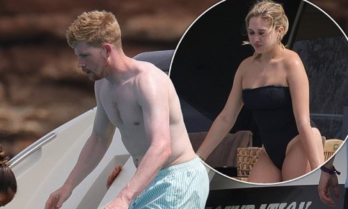 Kevin De Bruyne goes shirtless as he enjoys a boat trip with swimsuit-clad wife Michele Lacroix while soaking up the sun on family holiday in Ibiza