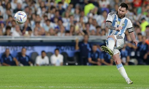 Lionel Messi scores his 800th career goal in his first game with Argentina since winning the World Cup, curling home a spectacular free-kick in the 89th minute of a 2-0 victory