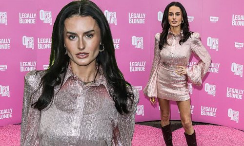 Amber Davies puts on a leggy display in a glitzy pink mini dress and edgy boots as she attends Legally Blonde press night