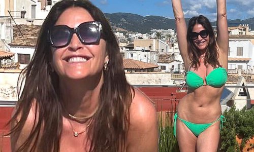 Lisa Snowdon, 51, shows off her jaw-dropping figure in green bikini on Mallorca getaway with fiancé George - after revealing she's 'at peace' with not having children