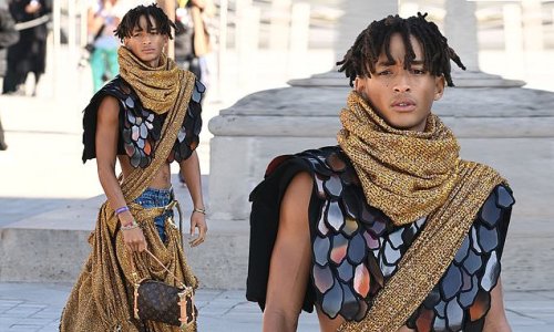 Jaden Smith turns heads in scaled crop top and gold body scarf as he attends Louis Vuitton Paris Fashion Week show