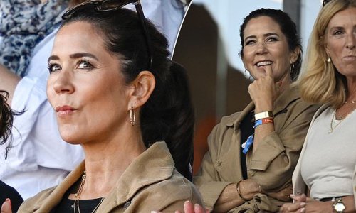 Crown Princess Mary of Denmark puts on an animated display as she watches the FEI World Championships