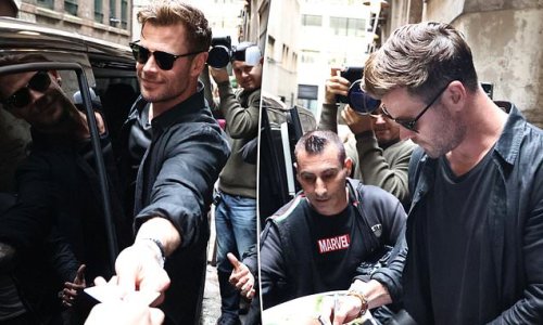 Chris Hemsworth is every inch the star as he stops to sign autographs for adoring fans in Sydney