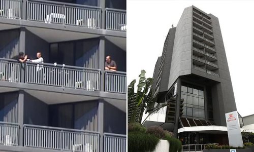 Guests in a quarantine hotel are caught handing items to each other