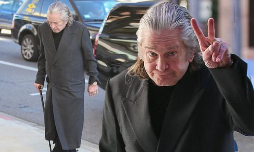 Frail Ozzy Osbourne flashes the peace sign as he steps out with the ...