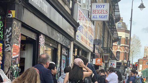 Bagel panic hits Brick Lane: Customers queue in their droves outside iconic Beigel Bake shop over...