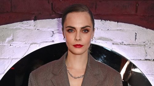 Cara Delevingne puts on a chic display in a stylish blazer dress for the Cabaret gala night at The...