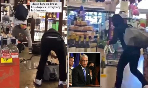 Smash and grab! Brazen thieves steal liquor worth thousands of dollars from Los Angeles store - with security standing by idly as looters cause chaos in Dem-led city which failed to recall woke DA George Gascon