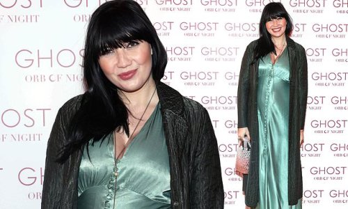 Pregnant Daisy Lowe looks stunning in a green silk maxi dress as she shows off her growing baby bump at the Ghost Fragrances Christmas Skate
