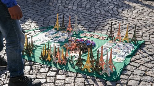 US brothers are beaten up with miniature Eiffel Towers after angering Paris street vendors by filming them