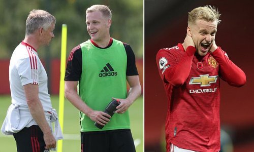 Donny van de Beek shares a smile with Ole Gunnar Solskjaer at training